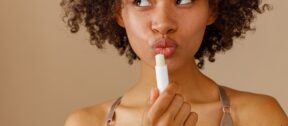 Lip balm being applied to the lips